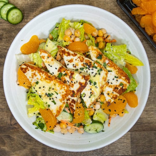 Souvlaqueria's Greek salad with grilled halloumi cheese, chickpeas, mandarin oranges, and cucumbers.